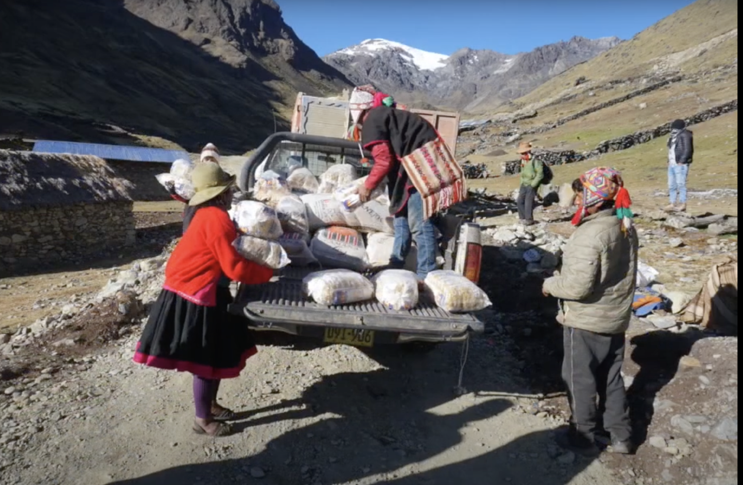 Q'ero community receiving emergency food supplies in the high Andes