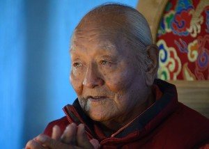 image shows Chögyal Namkhai Norbu, quoted on his essay about living in the present